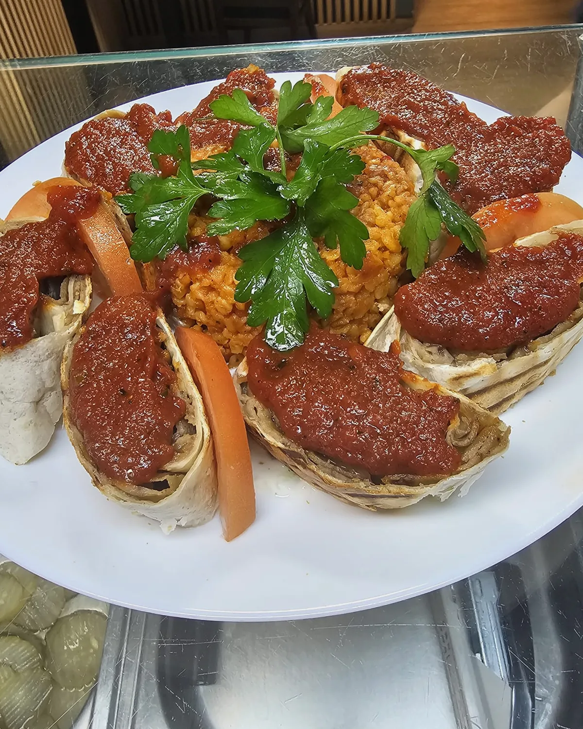 A dish with the meat, served on a plate